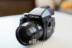 Contax 645 Camera body with film back & Planar 80mm f/2 lens. Great condition