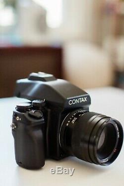 Contax 645 Camera body with film back & Planar 80mm f/2 lens. Great condition