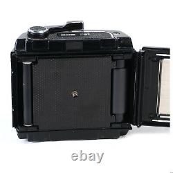 ^ Mamiya RB-67 Professional 120 6x7 Camera with 90mm f3.5 Lens with 1 Back